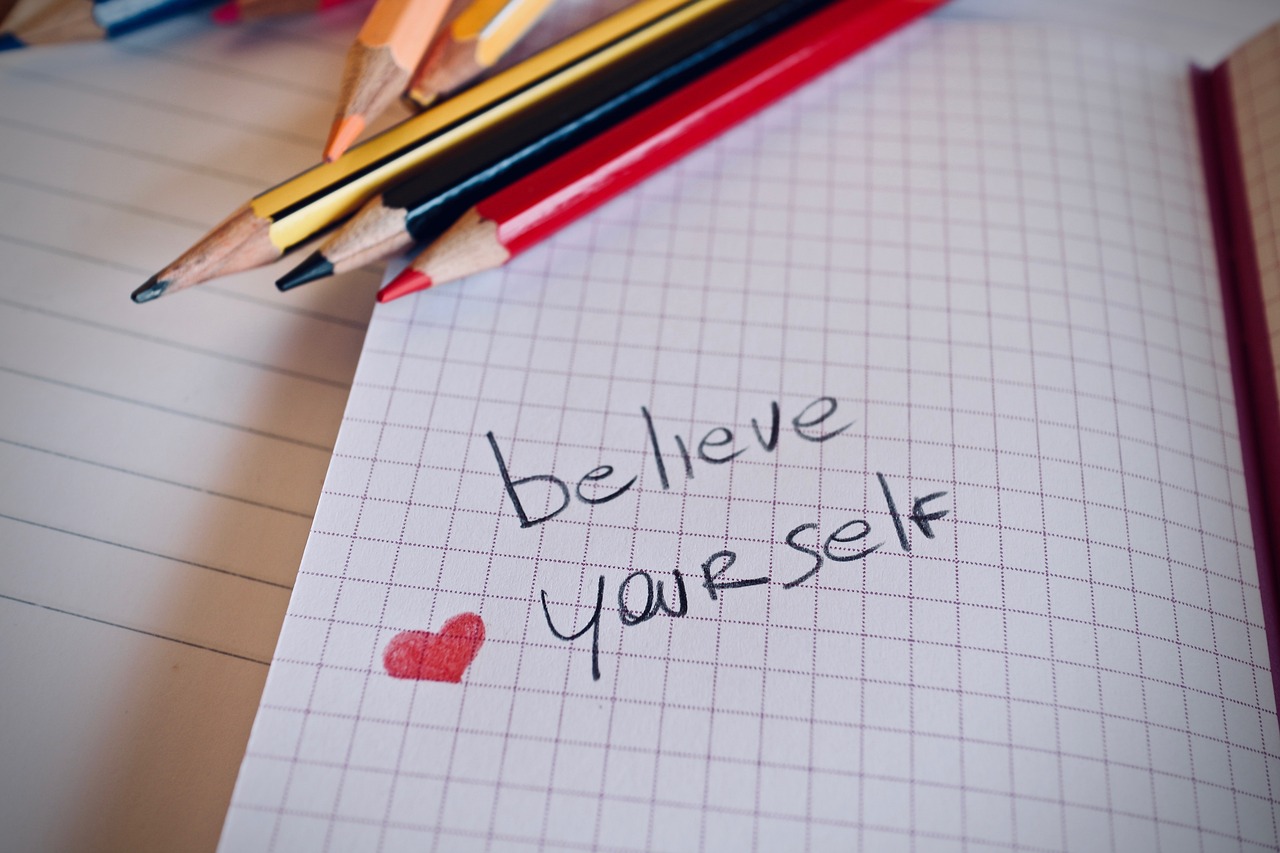 notebook, pencils, quote
